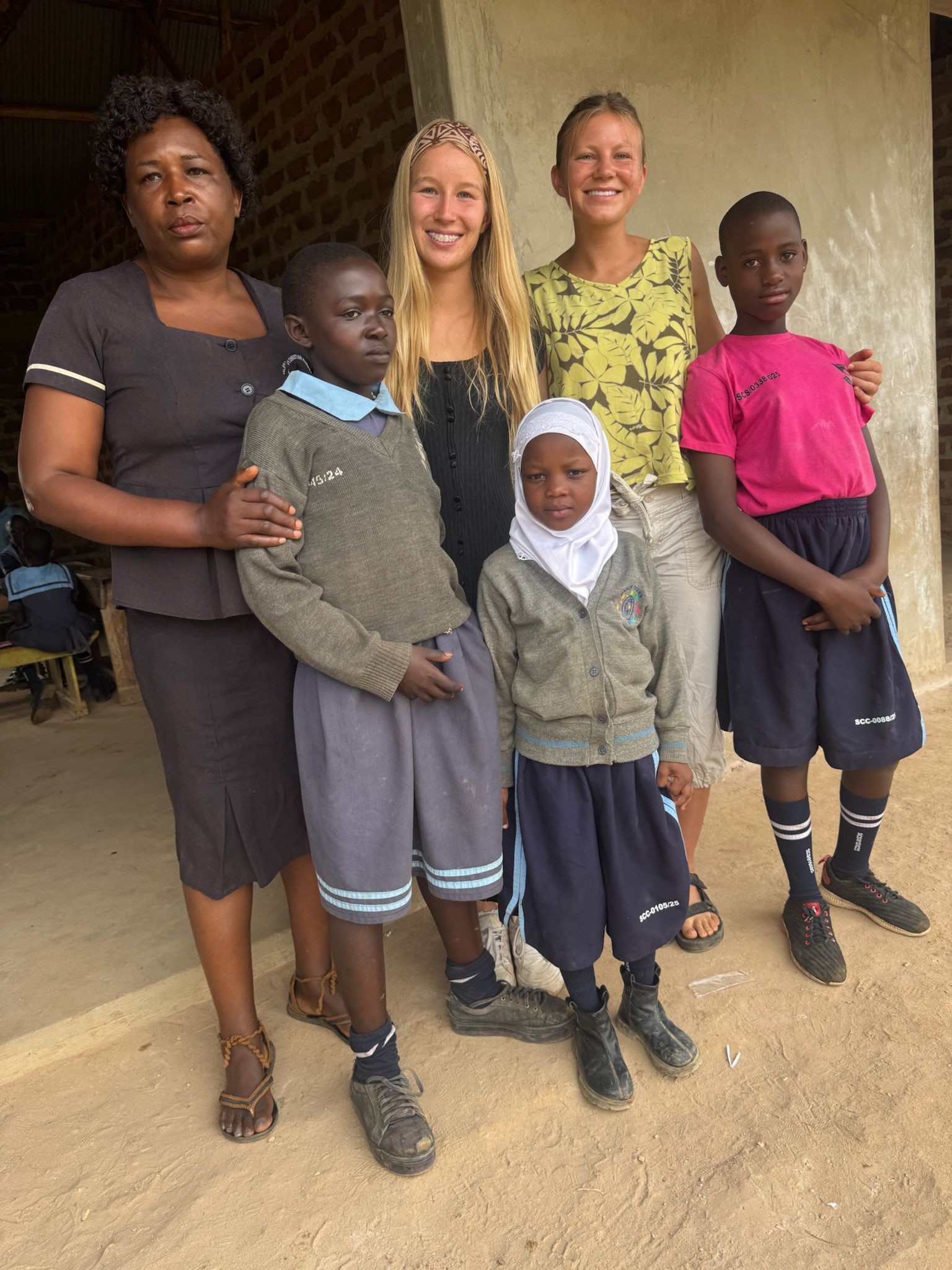 Staff and volunteers together at the school