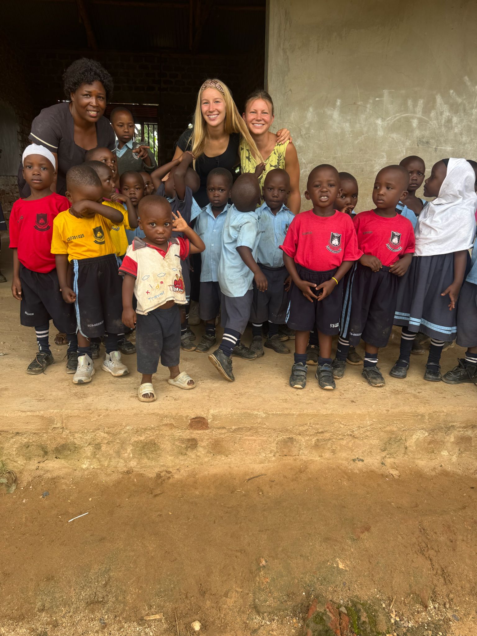 Volunteers with young children at Shekinah School